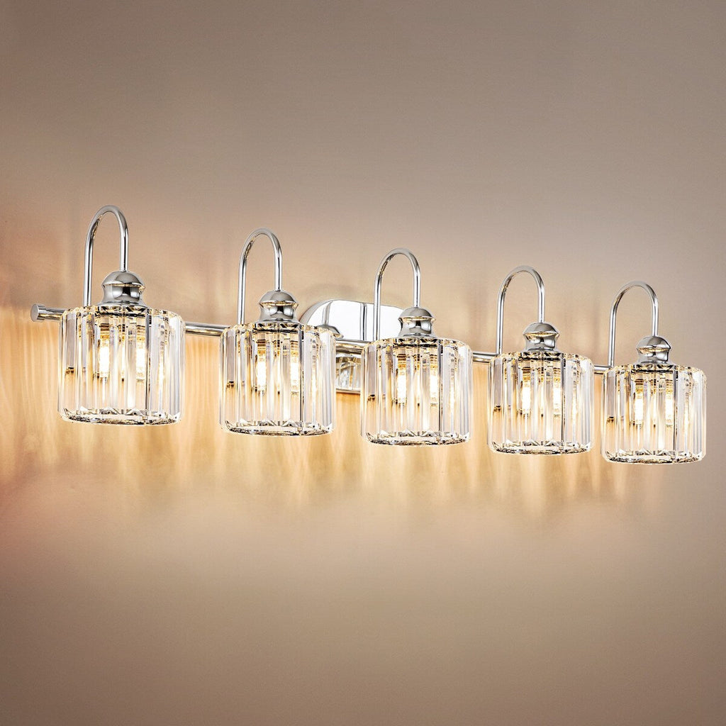 Lampada da bagno lineare Glam a 5 luci dimmerabile in cristallo con paralume cilindrico in cristallo