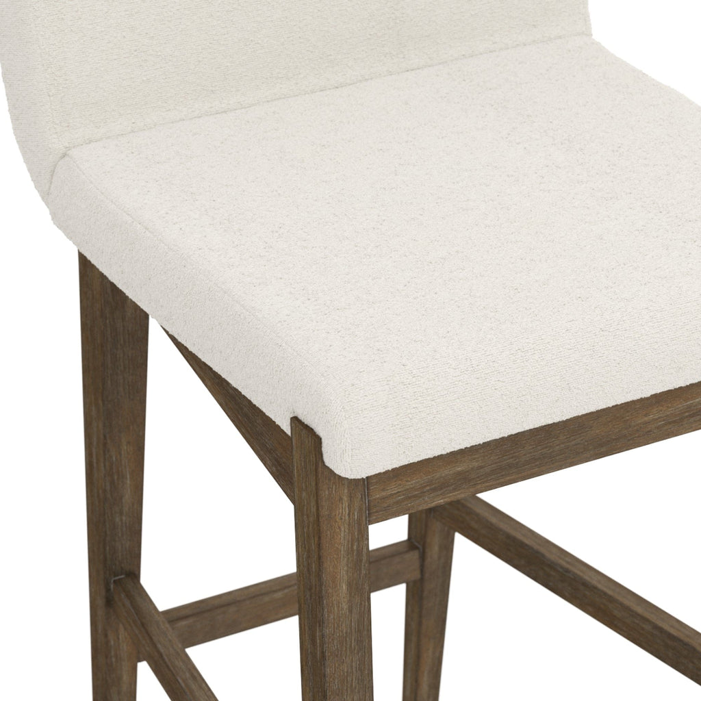 Sgabello da bar moderno Gracie, sedia imbottita in bouclé e gambe in legno spazzolato