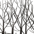 Decorazione da parete in metallo nero con campo di alberi