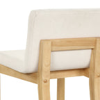 Sgabello da bar moderno Gracie, sedia imbottita in bouclé e gambe in legno spazzolato