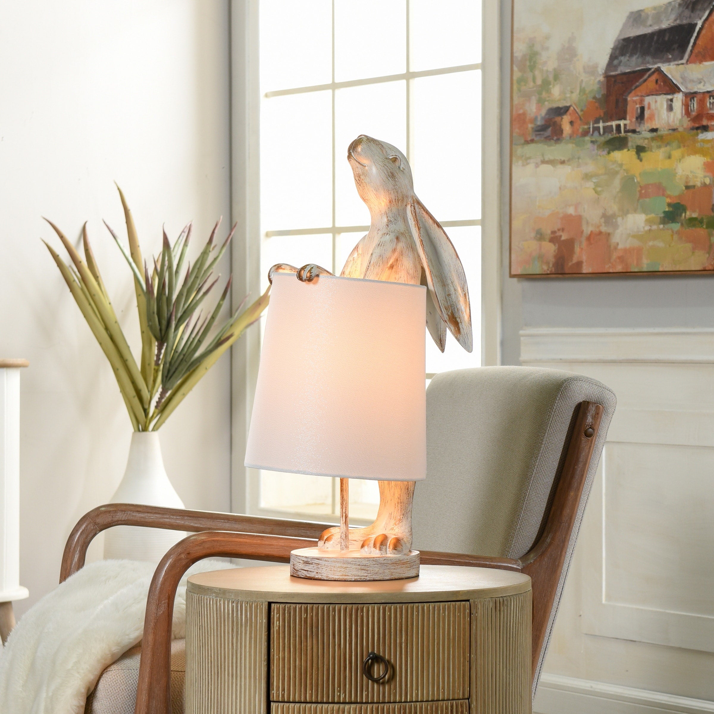 Lampada da scrivania StyleCraft Malta in rame chiaro e bianco lavato a forma di coniglio