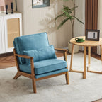 Poltrona imbottita in misto lino con gambe in legno e un cuscino beige