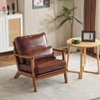 Poltrona imbottita in misto lino con gambe in legno e un cuscino beige