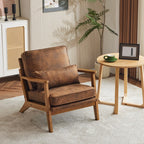 Poltrona imbottita in misto lino con gambe in legno e un cuscino beige