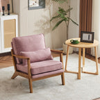 Poltrona imbottita in misto lino con gambe in legno e un cuscino beige